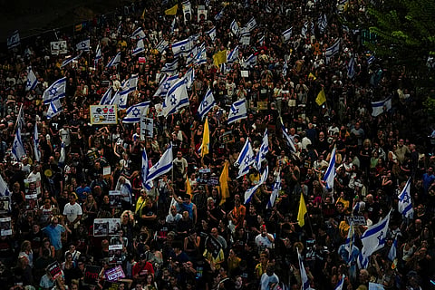 Israel-Hamas war: People attend a rally demanding a cease-fire deal and the immediate release of hostages in Tel Aviv